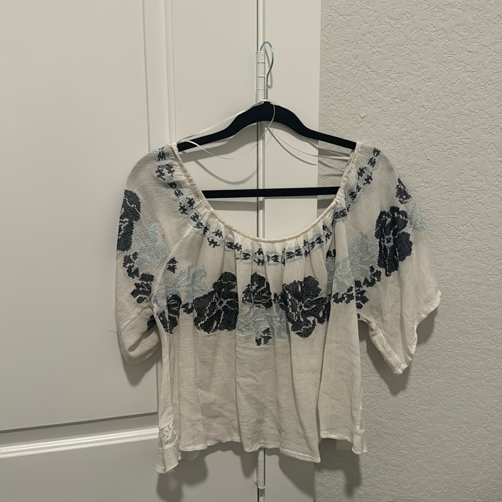 Cropped opened back gimmicks top